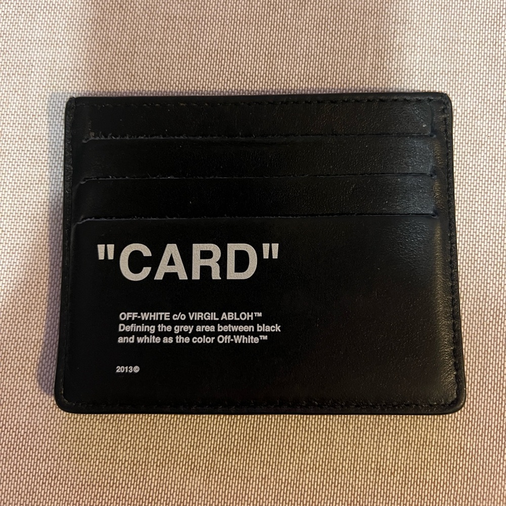off white card holder. great condition